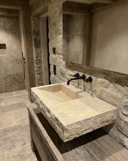 Wall-Mounted Travertine Arc Sink