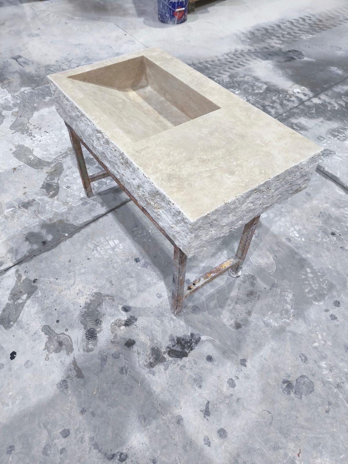 Wall-Mounted Travertine Arc Sink