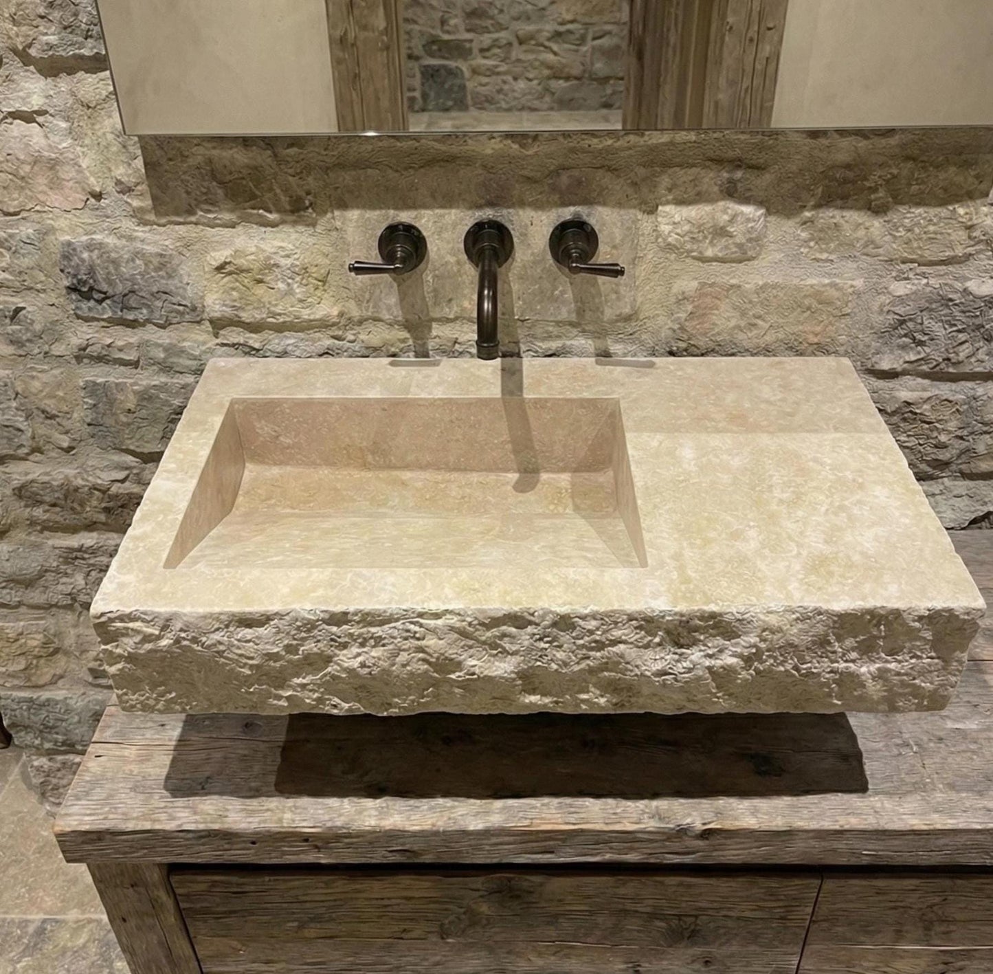 Wall-Mounted Travertine Arc Sink